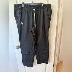 Adidas Black Sweatpants with Elastic Waistband and Relaxed Fit